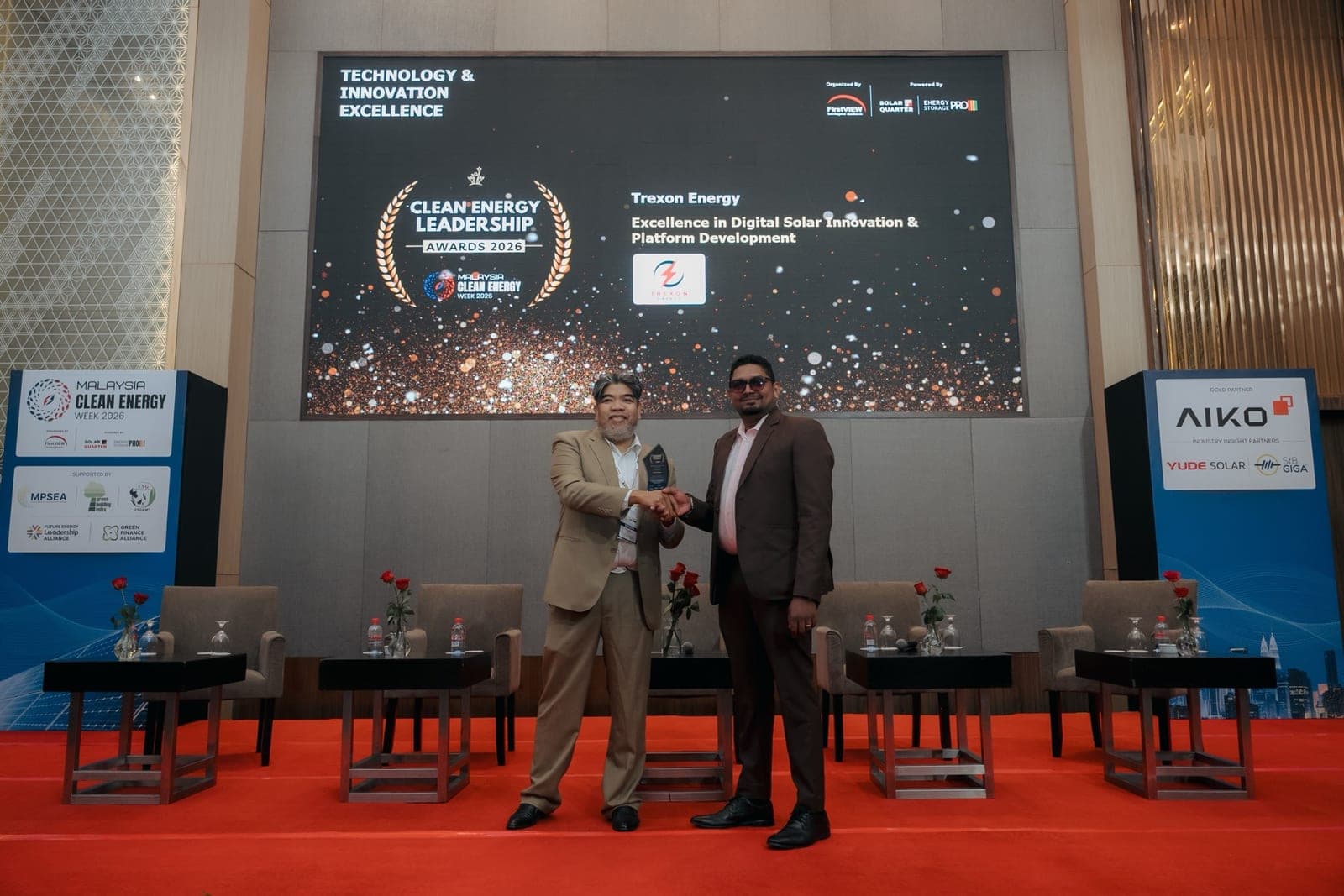 Chandra Rau accepting the Excellence in Digital Solar Innovation & Platform Development award for Trexon Energy at the Clean Energy Leadership Awards 2026, Malaysia Clean Energy Week 2026